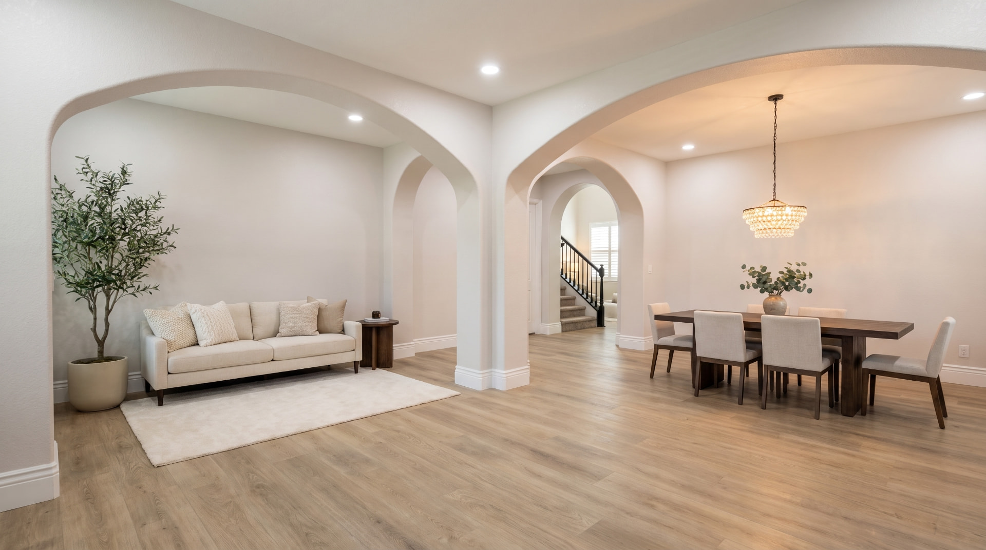 Bright modern living and dining space in a completed DK Homes remodel